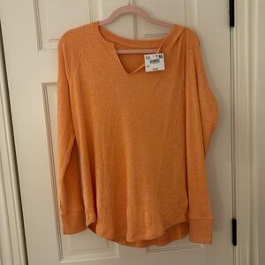 Orange knit sweater